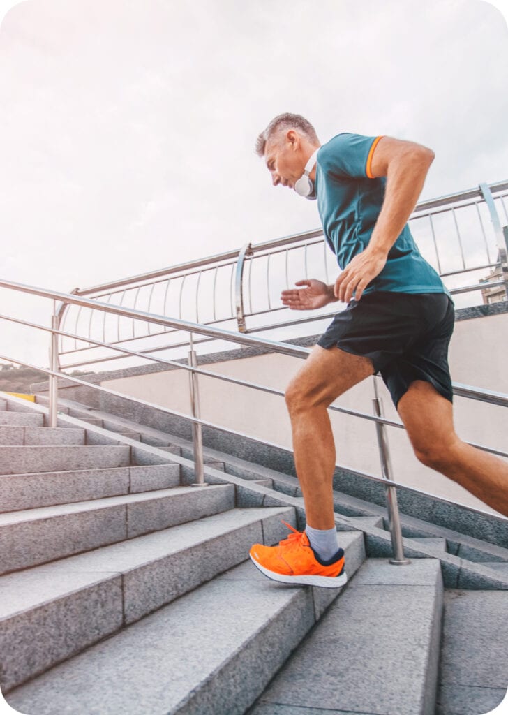 man runs on stairs